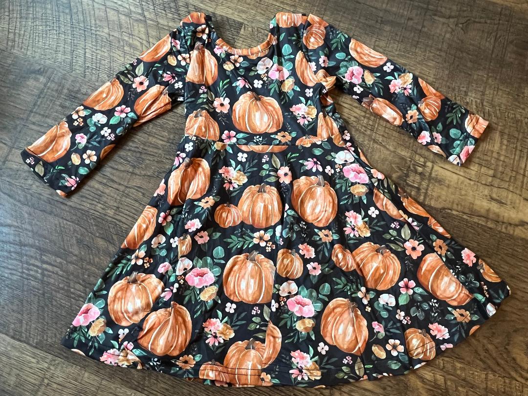 Pumpkin Skater Dress is a size 3T